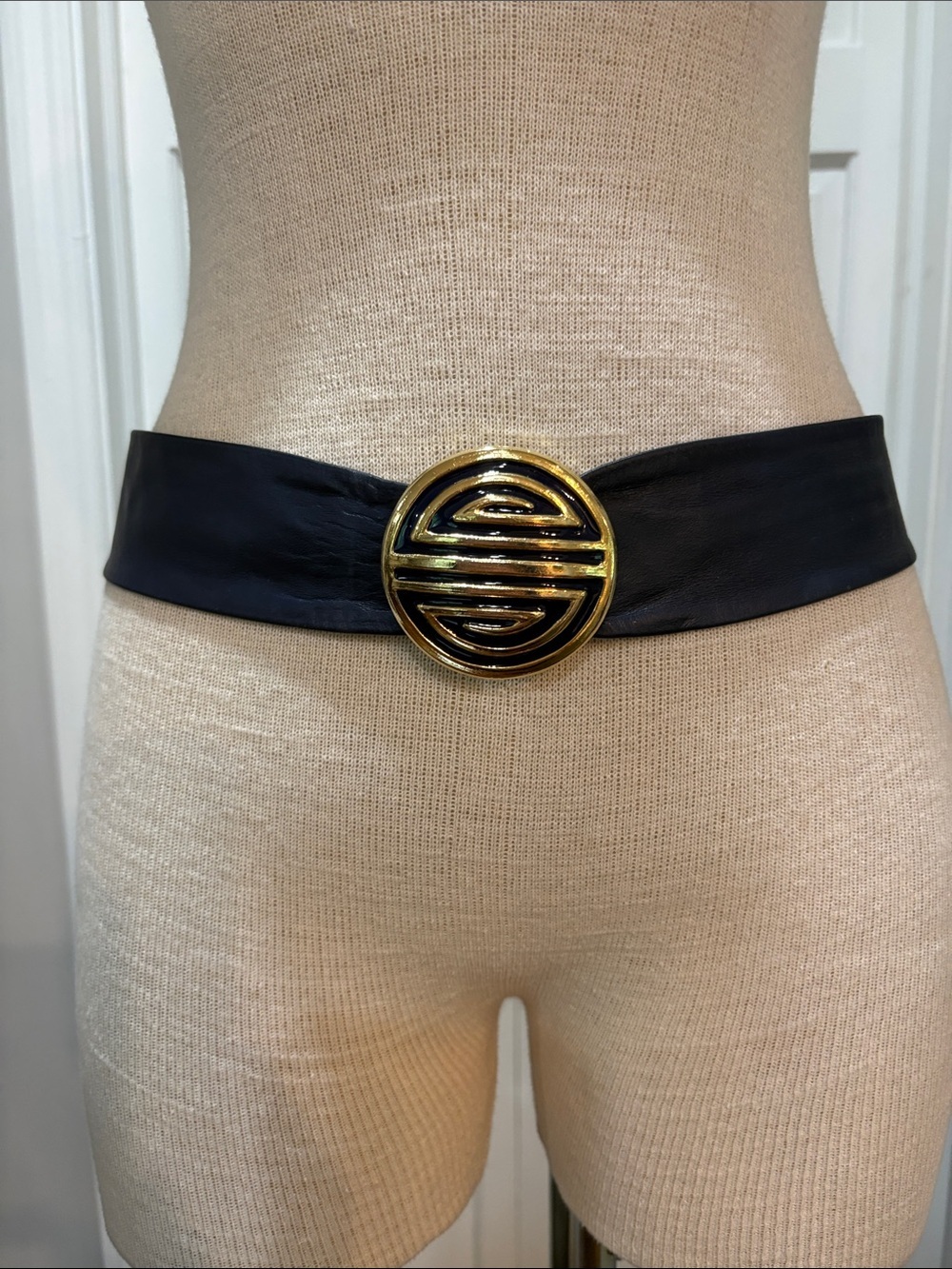 Vintage navy blue leather wide belt with gold and blue buckle.